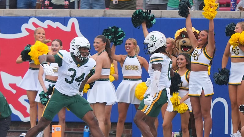 Baylor wide receiver Josh Cameron (34) celebrates scoring a touchdown with teammate Ashtyn...