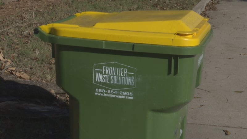 Frontier Waste Solutions recycling bin on the curb outside a home in Woodway, Texas