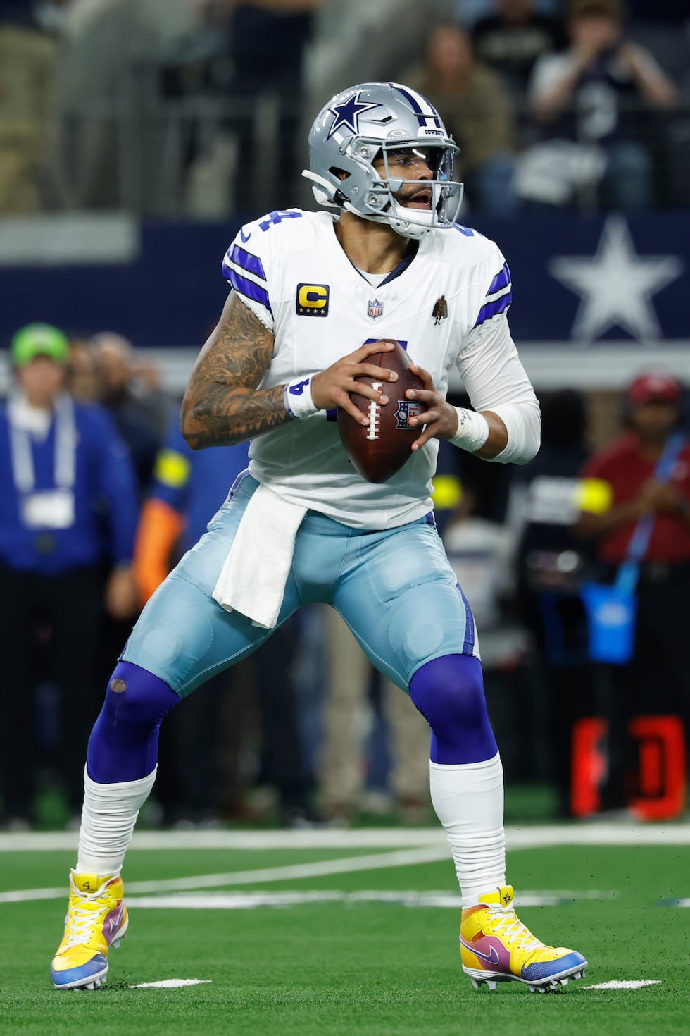 Dallas Cowboys quarterback Dak Prescott (4) looks to pass during a NFL football game against...