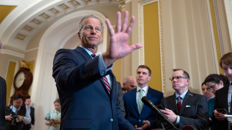 FILE: Senate Majority Leader John Thune, R-S.D., speaks to reporters at the Capitol in...