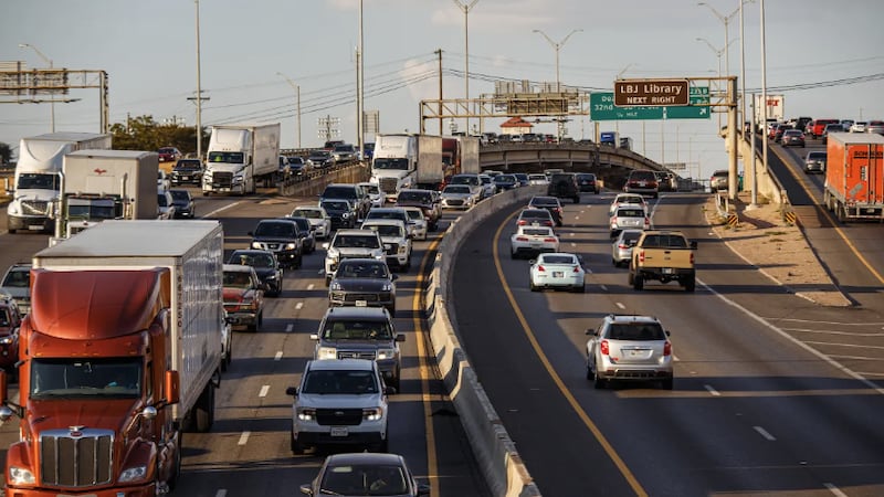 Rush hour traffic passes by on I-35 through downtown Austin on the evening of Sept. 7, 2023.