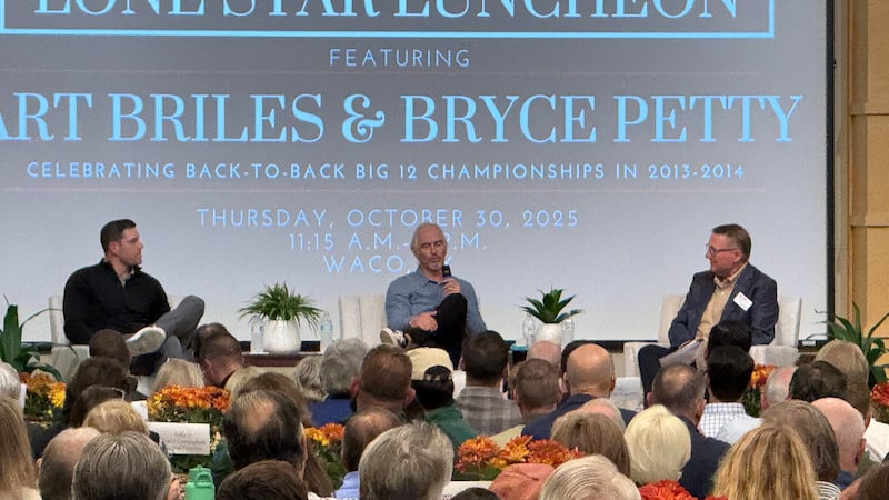 Art Briles and Bryce Petty speak in front of a packed house at the Texas Sports Hall of Fame.