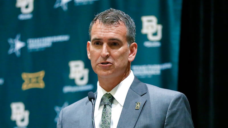 Baylor athletic director Mack Rhoades, responds to questions during a news conference at Big...